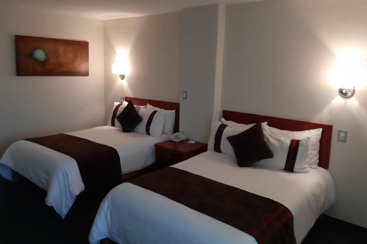 Mision Leon Hotel Bagian luar foto